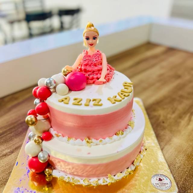 Doll theme birthday cake